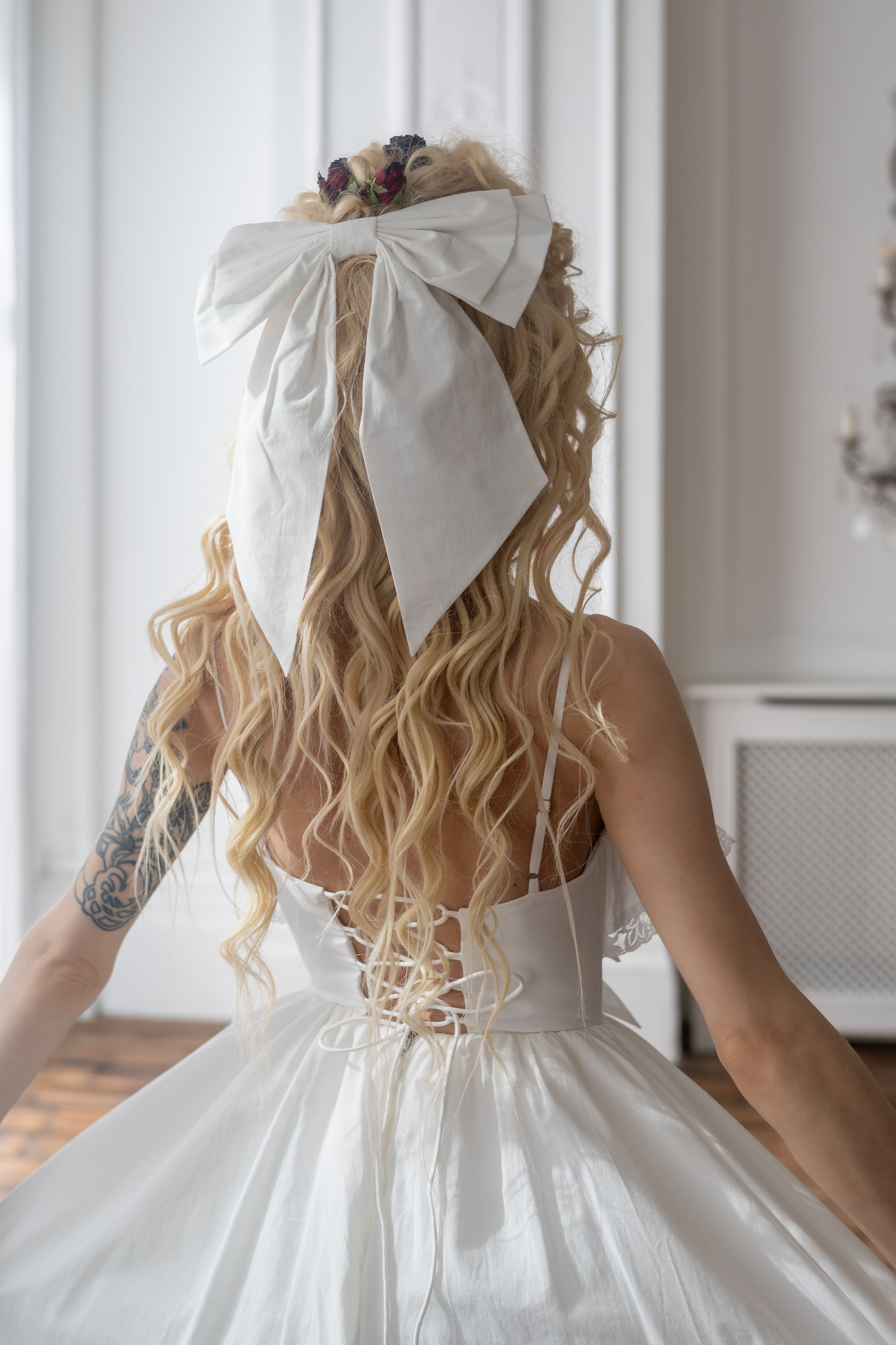 Ivory Sacrament Winged Bow