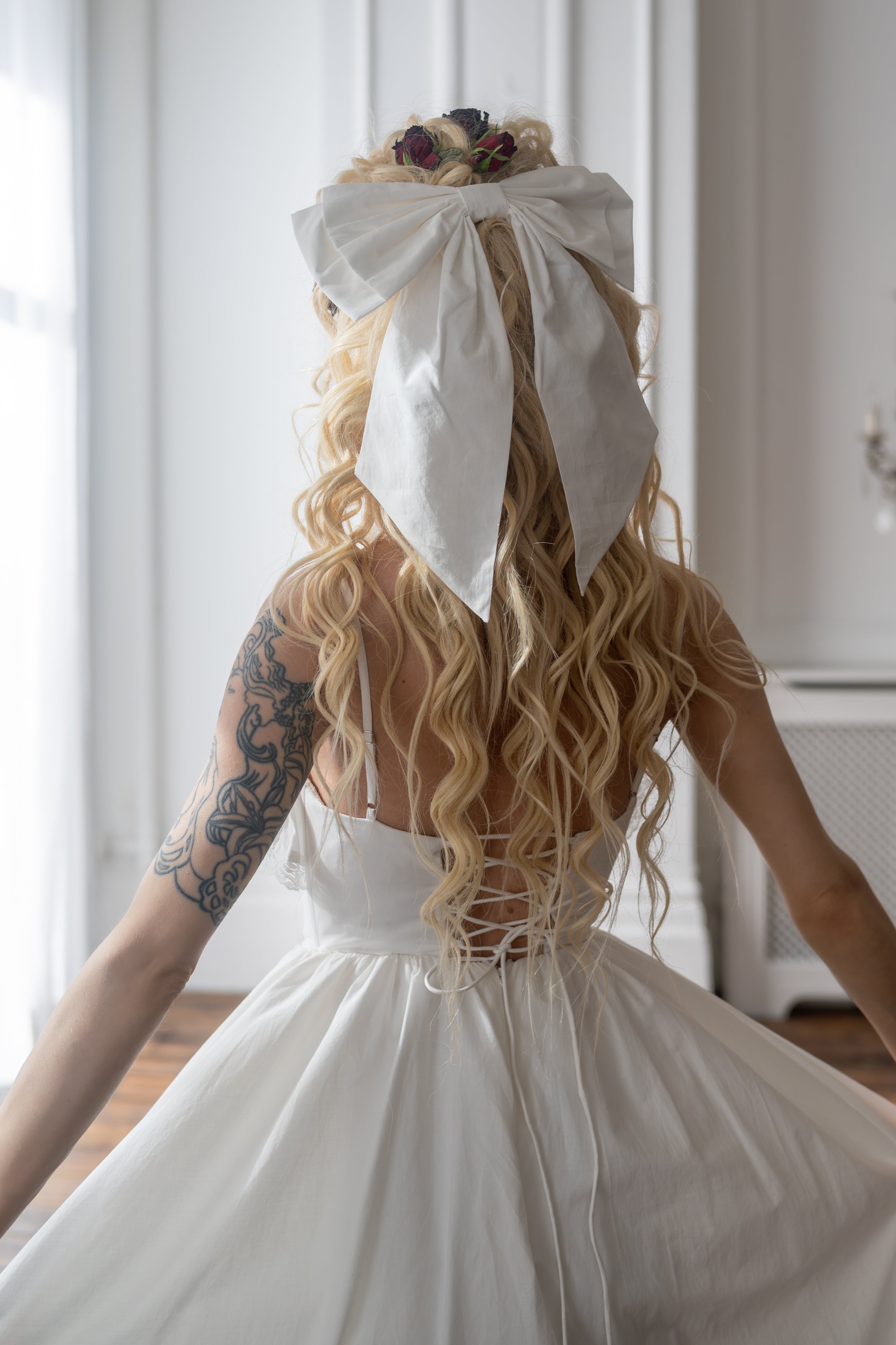 Ivory Sacrament Winged Bow