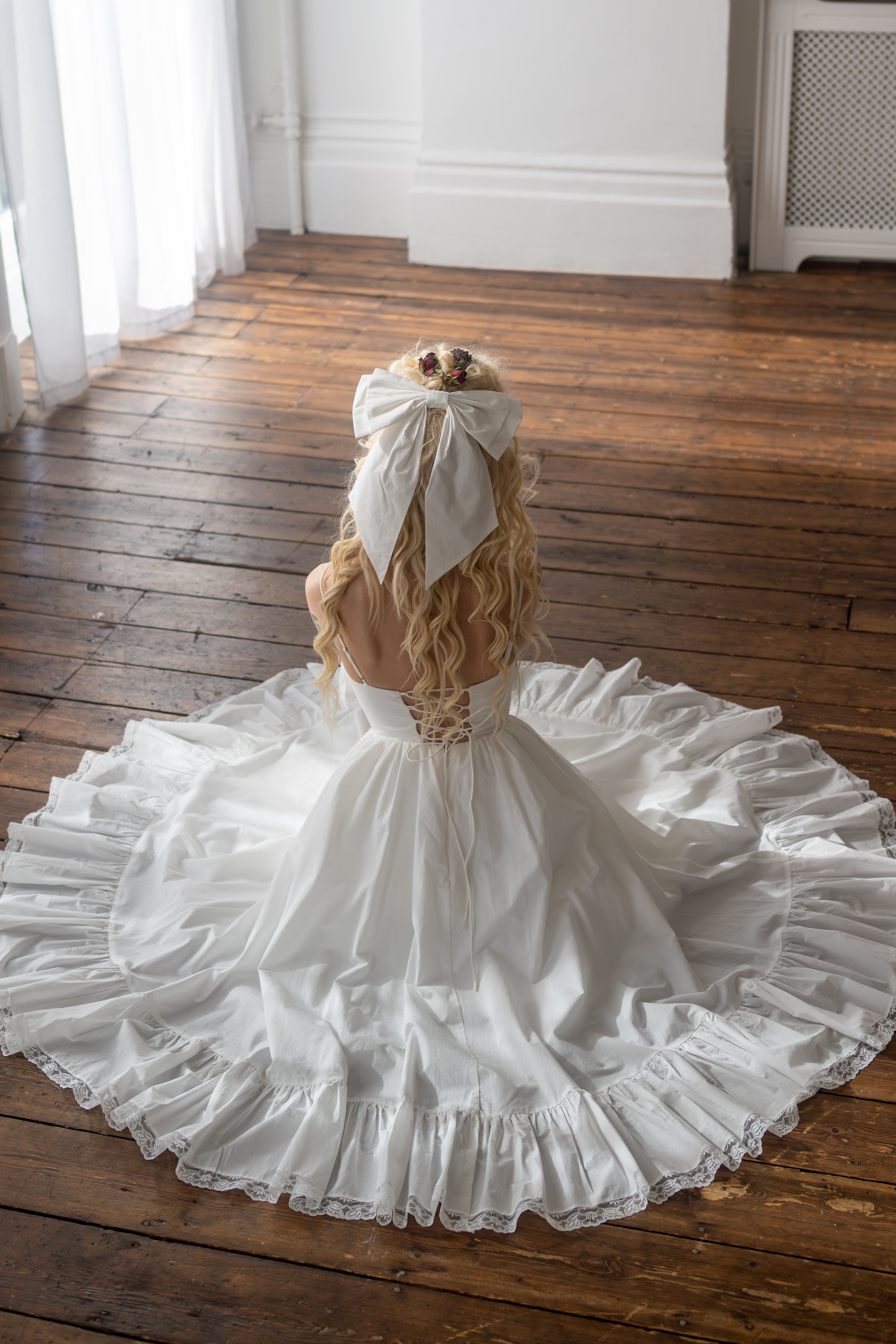 Ivory Sacrament Winged Bow